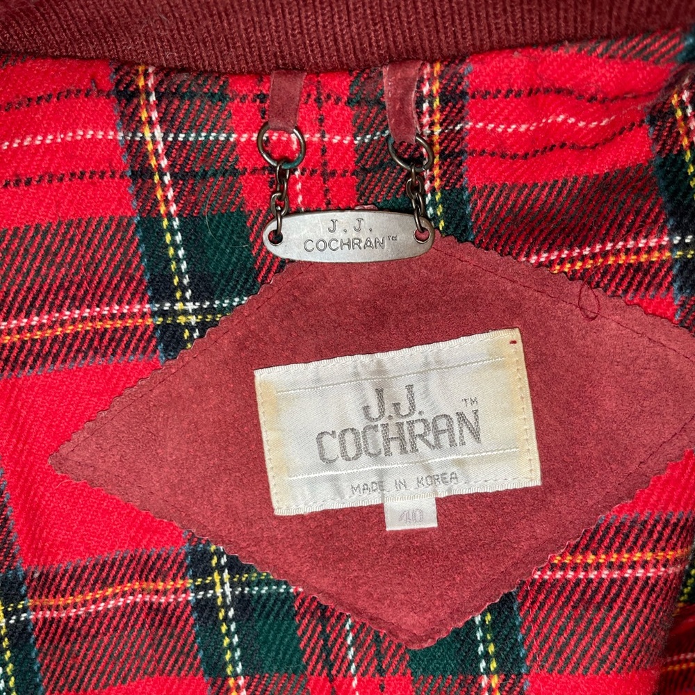 80s vintage JJ Cochran genuine red leather mens bomber jacket with plaid lining.
